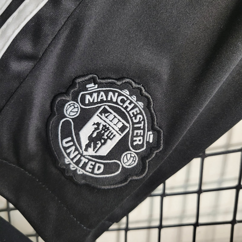 Kit Infantil Manchester United Titular 23/24