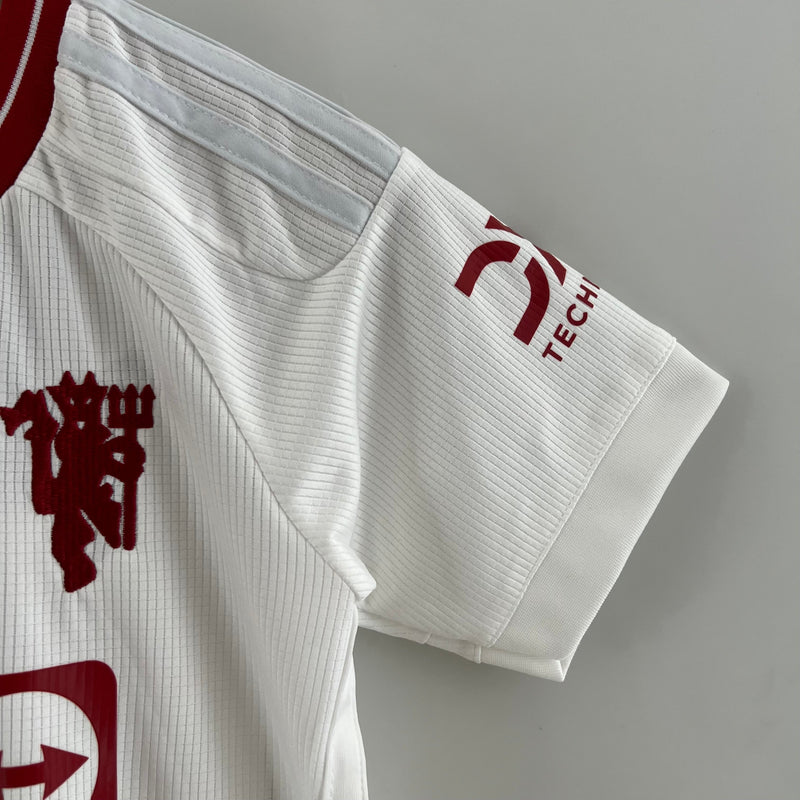 Kit Infantil Manchester United Reserva 23/24