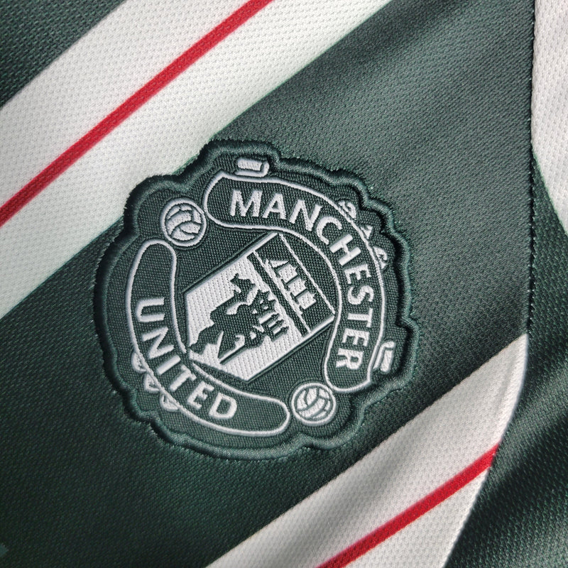 Kit Infantil Manchester United Titular 23/24
